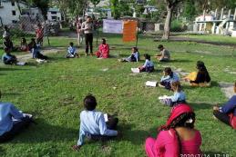 Budhinanda Basic School of Kolti, Bajura organized outdoor teaching with parents/guardians present to ensure continued learning 